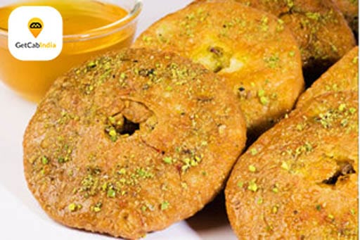 Delicacies of Jodhpur Mawa Kachori at Janta Sweet Home by Get Cab India.